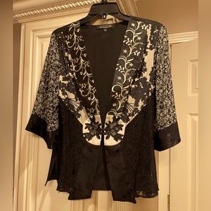 Classy and elegant. Dressy top with lace panels. Black/ Cream. Size M. Studio VK